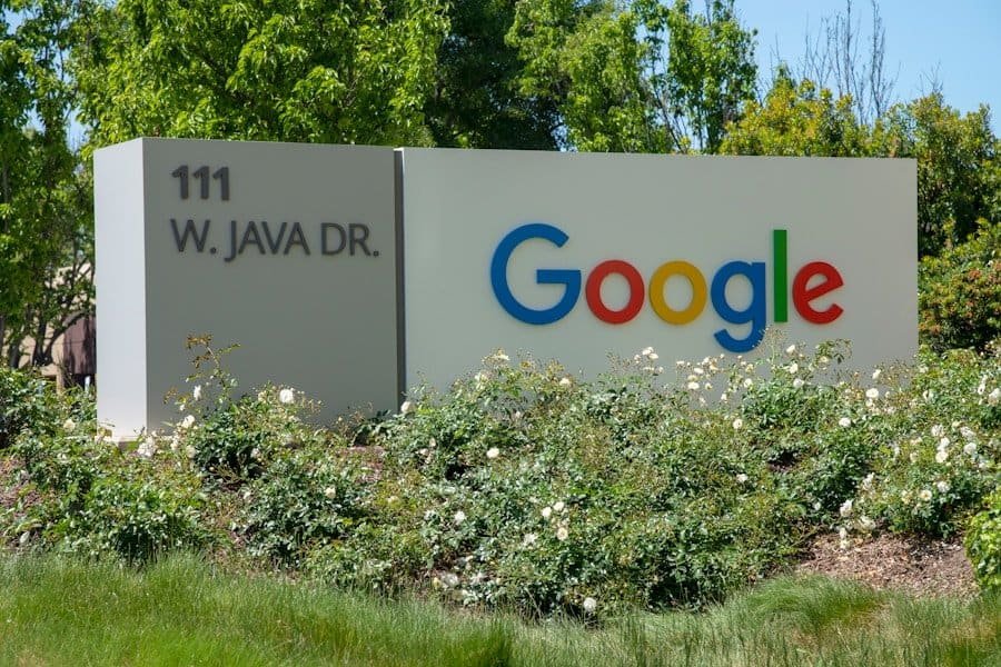 Google's corporate office sign at 111 w. java dr. surrounded by greenery.