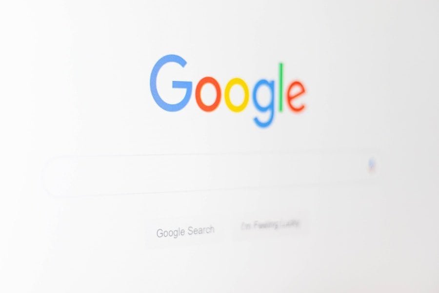 Blurred image of the google search engine homepage.